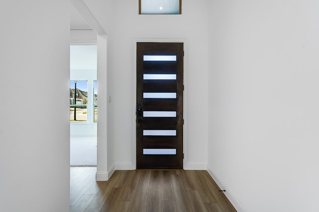 4251 Arlington Ave, Mckinney, TX 75071 - foyer entrance with dark wood finished floors and baseboards