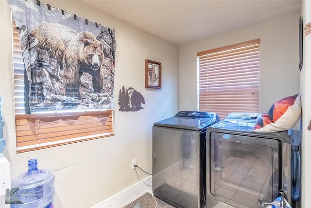 890 Vine St, Abilene, TX 79602 - laundry room with washer and dryer and baseboards