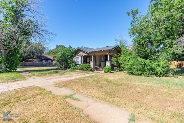 890 Vine St, Abilene, TX 79602 - bungalow-style home featuring a porch and a front yard