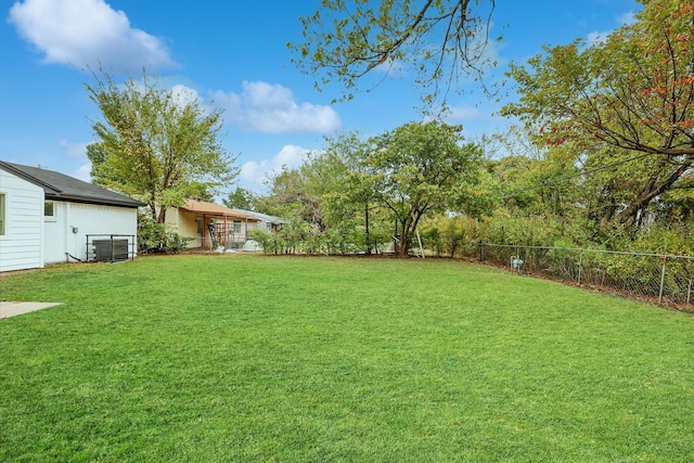 1427 Oriole Blvd, Duncanville, TX 75116 - view of yard featuring central AC unit