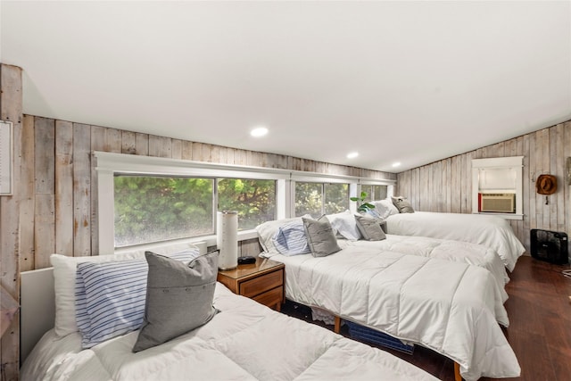 2029 Austin Aisle, Tool, TX 75143 - bedroom featuring wood walls, wood finished floors, and cooling unit