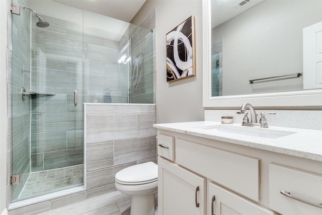 5913 Lewis St, Dallas, TX 75206 - bathroom with vanity, toilet, and a shower stall