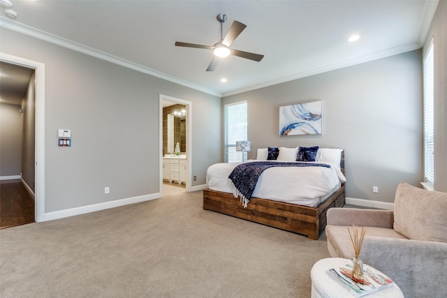 5913 Lewis St, Dallas, TX 75206 - bedroom with crown molding, baseboards, light carpet, a ceiling fan, and connected bathroom