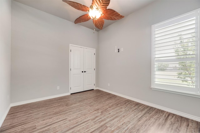 760 E Northside Dr, Pilot Point, TX 76258 - spare room with light wood finished floors, ceiling fan, and baseboards