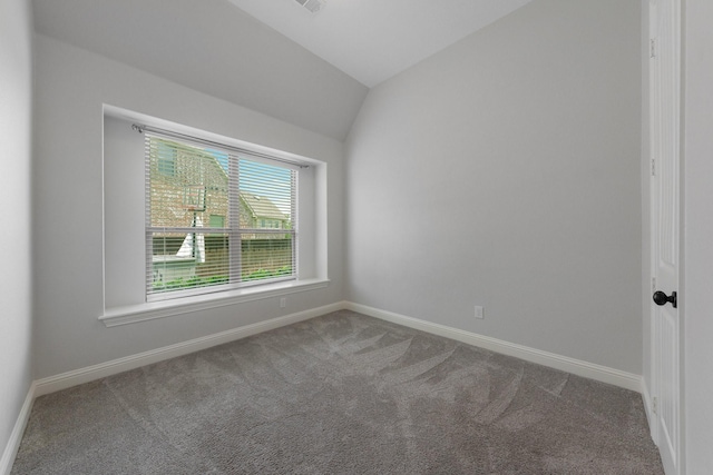 7340 San Felipe Dr, Irving, TX 75039 - carpeted empty room featuring vaulted ceiling and baseboards