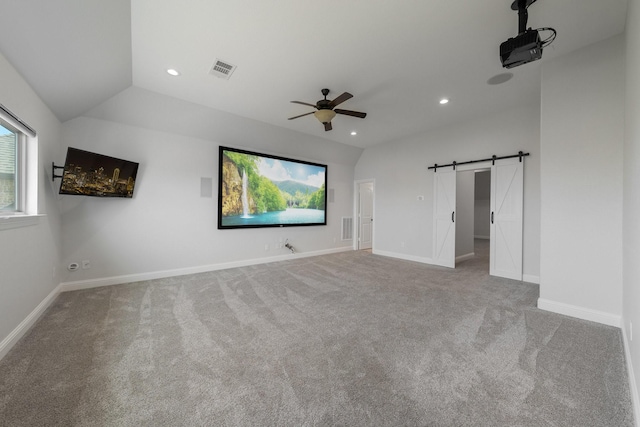 7340 San Felipe Dr, Irving, TX 75039 - unfurnished bedroom featuring a barn door, carpet, recessed lighting, and baseboards