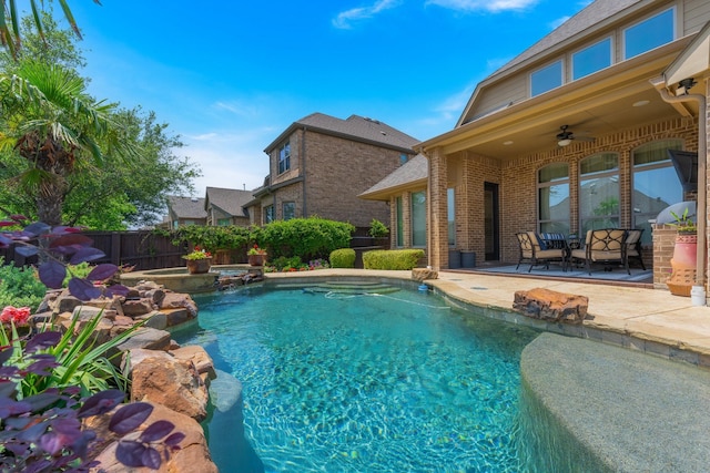 7340 San Felipe Dr, Irving, TX 75039 - view of swimming pool featuring ceiling fan, a patio area, and a pool with connected hot tub