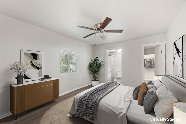 1806 Maryland Ave, Dallas, TX 75216 - bedroom with dark wood finished floors, baseboards, and ensuite bathroom