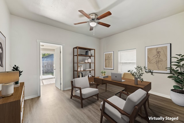 1806 Maryland Ave, Dallas, TX 75216 - office with a ceiling fan, light wood-style floors, and baseboards