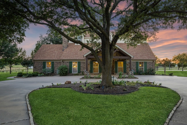 222 Bayne Rd, Haslet, TX 76052 - view of front facade with curved driveway, roof with shingles, and brick siding