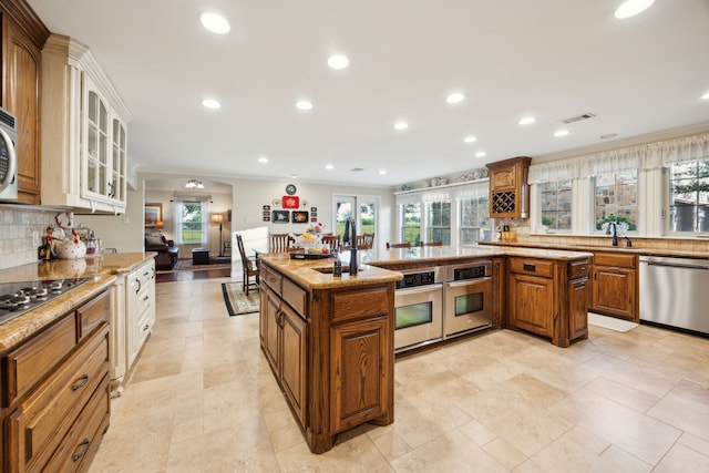 222 Bayne Rd, Haslet, TX 76052 - kitchen with stainless steel dishwasher, healthy amount of natural light, backsplash, and recessed lighting