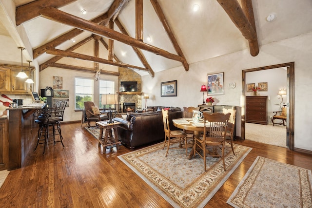 222 Bayne Rd, Haslet, TX 76052 - dining room with beamed ceiling, a fireplace, dark wood finished floors, recessed lighting, and high vaulted ceiling