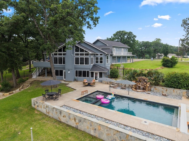 125 Oak Creek Dr, Tool, TX 75143 - rear view of house featuring outdoor dining area, stairway, a patio, a pool with connected hot tub, and a shingled roof