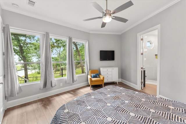 125 Oak Creek Dr, Tool, TX 75143 - bedroom featuring wood finished floors, multiple windows, baseboards, ornamental molding, and ensuite bathroom