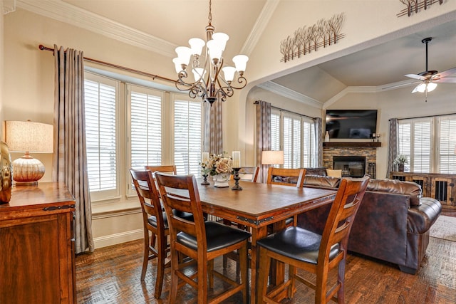 7205 E Nirvana Cir, North Richland Hills, TX 76182 - dining space with lofted ceiling, dark wood-type flooring, ceiling fan, a chandelier, and a stone fireplace
