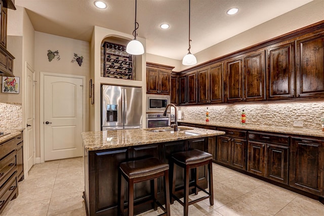 7205 E Nirvana Cir, North Richland Hills, TX 76182 - kitchen with stainless steel appliances, decorative backsplash, light tile patterned flooring, light stone counters, and recessed lighting