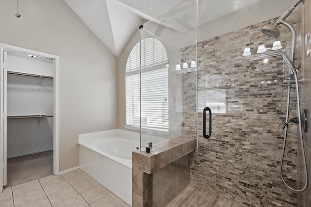 2308 Grandview Dr, Flower Mound, TX 75028 - bathroom featuring a garden tub, a stall shower, lofted ceiling, tile patterned floors, and plenty of natural light