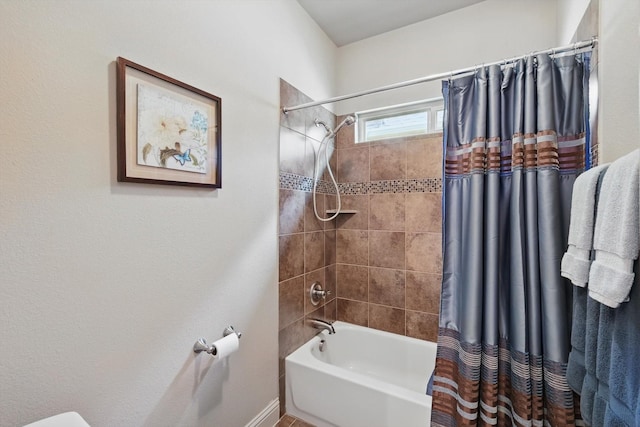 8913 Honeysuckle Dr, Lantana, TX 76226 - bathroom with shower / tub combo and toilet