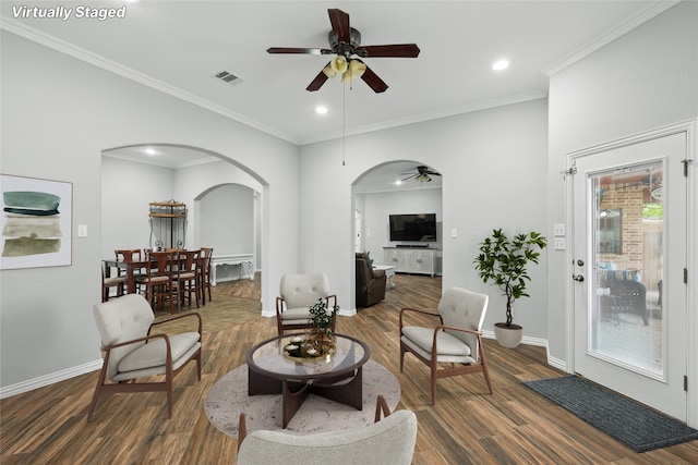 3241 Caleb Ct E, Midlothian, TX 76065 - living area featuring arched walkways, ceiling fan, wood finished floors, ornamental molding, and recessed lighting
