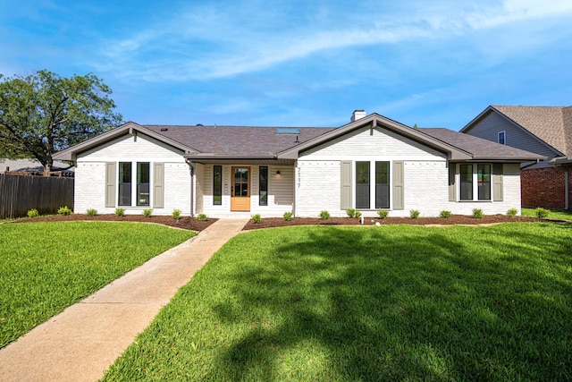 7117 La Sobrina Dr, Dallas, TX 75248 - view of front of property with brick siding and a chimney
