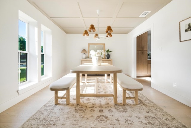 7117 La Sobrina Dr, Dallas, TX 75248 - dining area with a chandelier, wood finished floors, and coffered ceiling