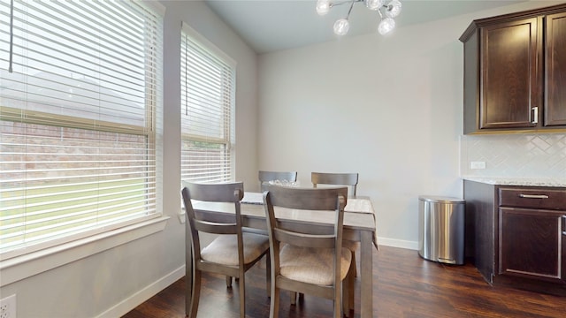 1916 Prestige Cove Ct, Wylie, TX 75098 - dining space with baseboards, dark wood-style floors, and a chandelier