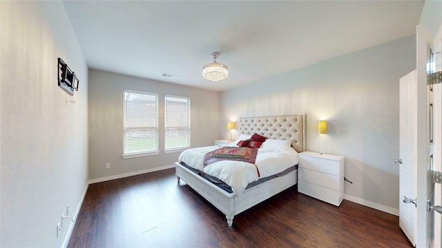 1916 Prestige Cove Ct, Wylie, TX 75098 - bedroom with baseboards and dark wood-type flooring