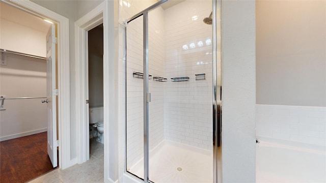 1916 Prestige Cove Ct, Wylie, TX 75098 - full bathroom with a stall shower, a garden tub, toilet, and a spacious closet