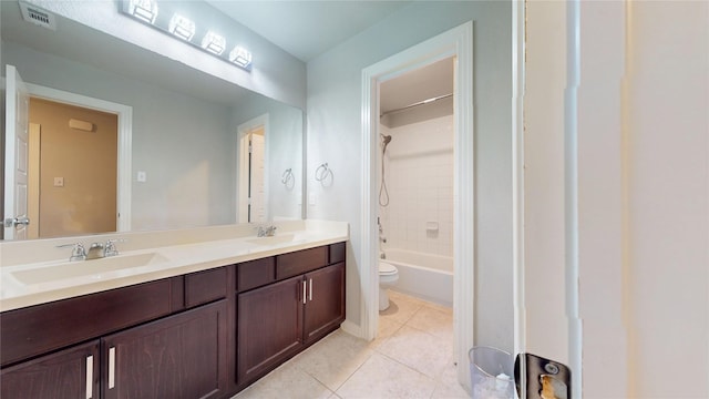 1916 Prestige Cove Ct, Wylie, TX 75098 - bathroom featuring toilet, double vanity, tile patterned flooring, and tub / shower combination