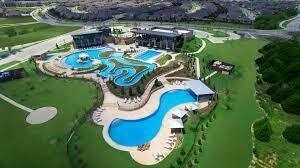 1916 Prestige Cove Ct, Wylie, TX 75098 - aerial view of property and surrounding area featuring a pool area