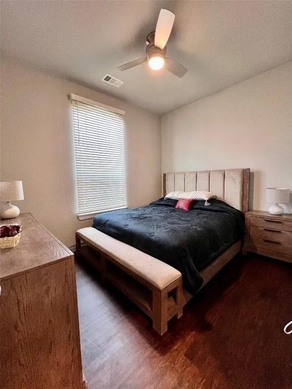 1916 Prestige Cove Ct, Wylie, TX 75098 - bedroom with ceiling fan and dark wood-type flooring