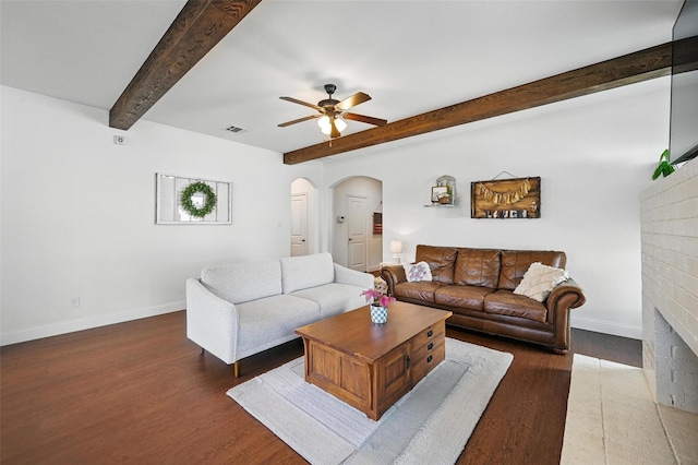 5224 Sonata Trl, Fort Worth, TX 76126 - living area featuring arched walkways, wood finished floors, baseboards, beamed ceiling, and a ceiling fan