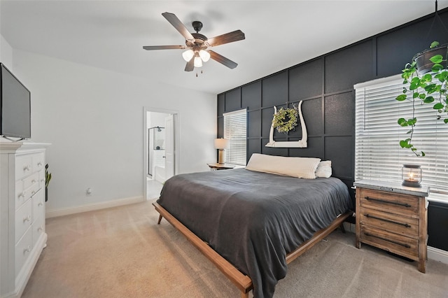 5224 Sonata Trl, Fort Worth, TX 76126 - bedroom featuring light carpet, baseboards, ensuite bathroom, and a ceiling fan