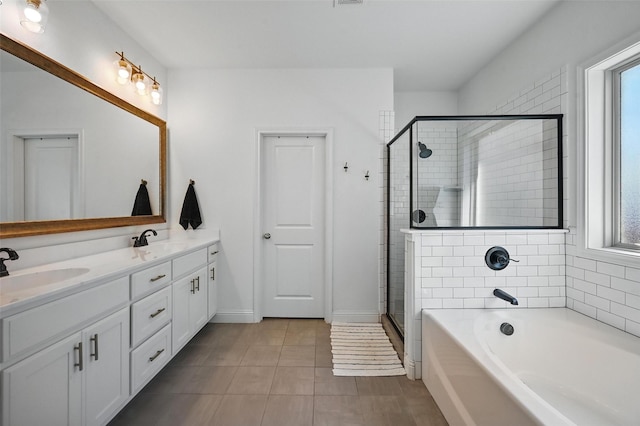 5224 Sonata Trl, Fort Worth, TX 76126 - full bathroom with double vanity, a garden tub, a stall shower, tile patterned flooring, and baseboards
