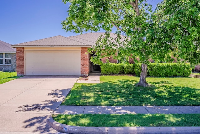 1423 Queen Annes Dr, Burleson, TX 76028 - view of front of house featuring a garage, a front yard, driveway, and brick siding