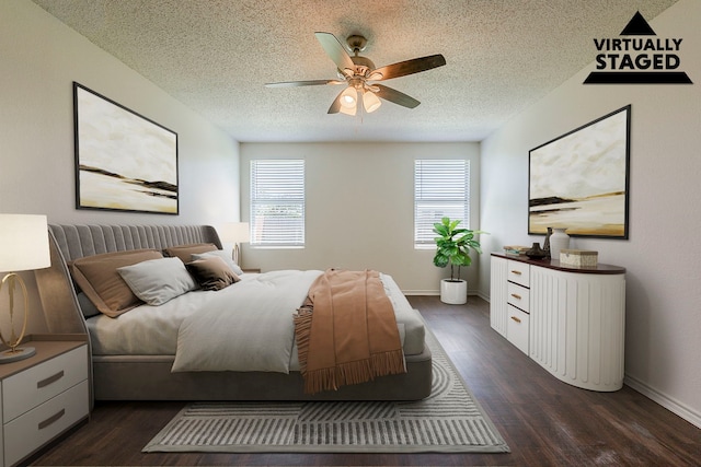1423 Queen Annes Dr, Burleson, TX 76028 - bedroom featuring multiple windows, a textured ceiling, dark wood finished floors, and a ceiling fan