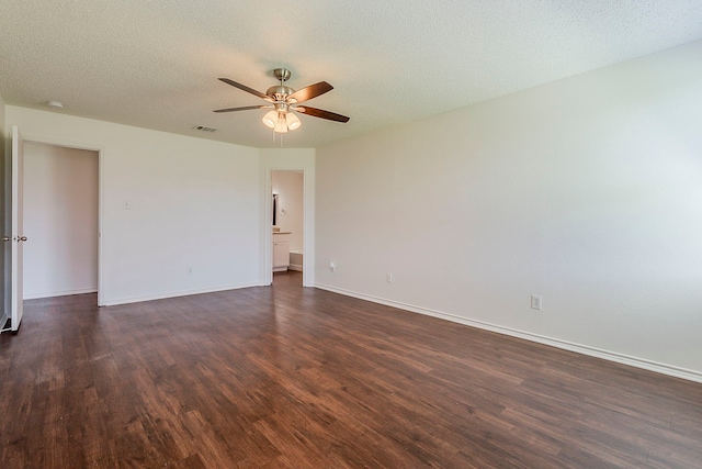1423 Queen Annes Dr, Burleson, TX 76028 - unfurnished room featuring ceiling fan, dark wood finished floors, baseboards, and a textured ceiling