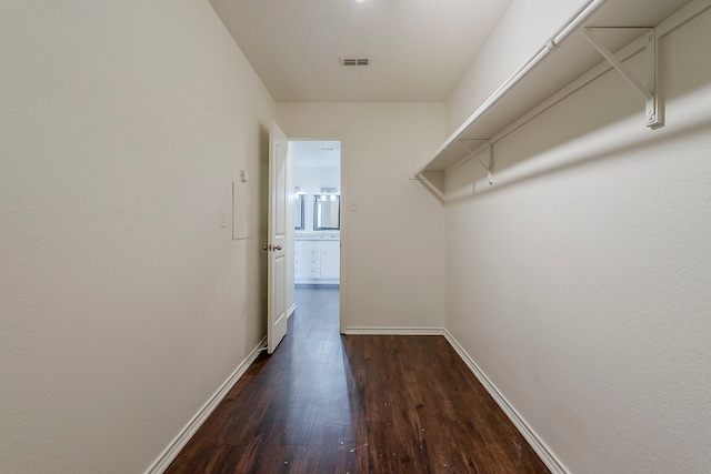 1423 Queen Annes Dr, Burleson, TX 76028 - spacious closet with wood finished floors