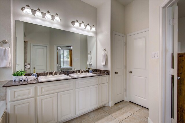 1328 Sandpiper Dr, Forney, TX 75126 - full bath featuring tile patterned flooring and double vanity