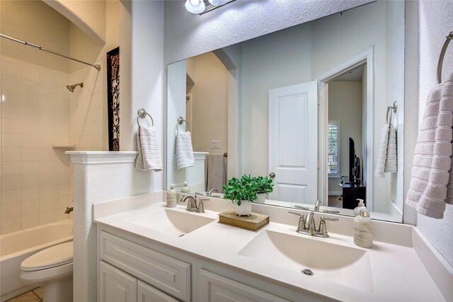 1328 Sandpiper Dr, Forney, TX 75126 - full bath featuring toilet, double vanity, and washtub / shower combination