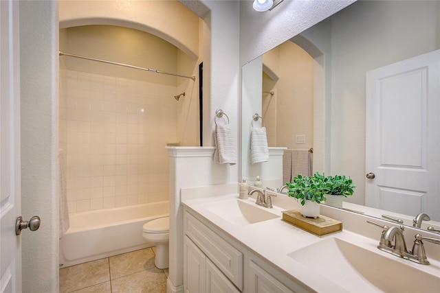 1328 Sandpiper Dr, Forney, TX 75126 - bathroom featuring double vanity, toilet,  shower combination, and tile patterned flooring