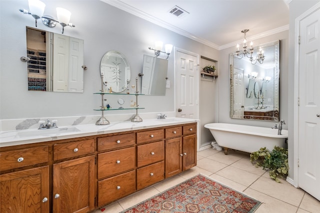 1467 Limerick Ct, Keller, TX 76262 - bathroom with a chandelier, crown molding, double vanity, a freestanding bath, and tile patterned floors