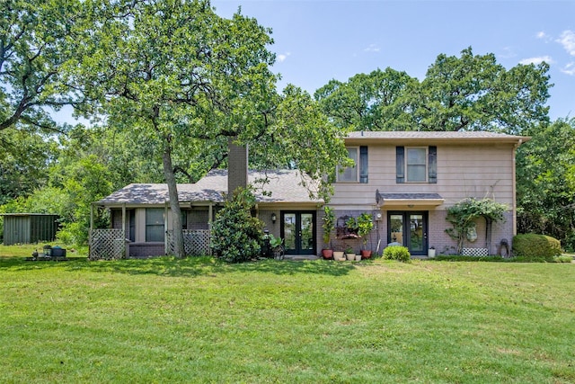 1467 Limerick Ct, Keller, TX 76262 - view of front of home featuring french doors, a front lawn, a chimney, and brick siding