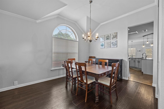 712 Saint Robby Dr, Mansfield, TX 76063 - dining space featuring dark wood-type flooring, a chandelier, lofted ceiling, baseboards, and crown molding