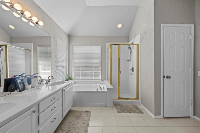 712 Saint Robby Dr, Mansfield, TX 76063 - bathroom with lofted ceiling, a textured wall, tile patterned flooring, a garden tub, and a stall shower