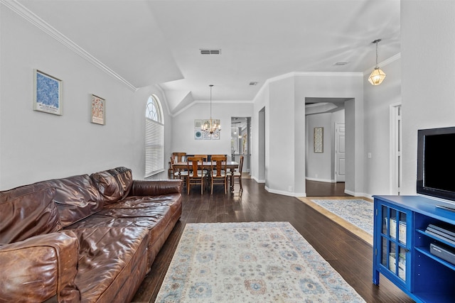 712 Saint Robby Dr, Mansfield, TX 76063 - living room featuring ornamental molding, a chandelier, dark wood finished floors, lofted ceiling, and baseboards