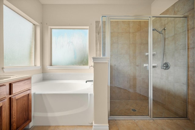 700 Sage Brush Dr, Weatherford, TX 76087 - full bathroom featuring a garden tub, a stall shower, vanity, and tile patterned floors