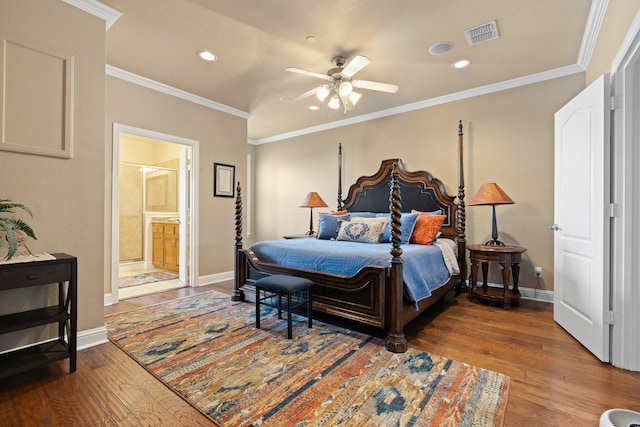 706 E 1st St, Fort Worth, TX 76102 - bedroom featuring recessed lighting, wood finished floors, baseboards, ornamental molding, and connected bathroom