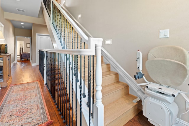 706 E 1st St, Fort Worth, TX 76102 - staircase with wood finished floors and baseboards
