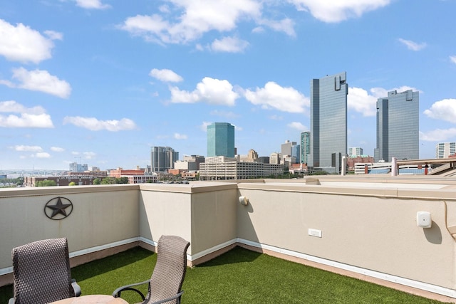 706 E 1st St, Fort Worth, TX 76102 - view of patio with a view of skyline and a balcony